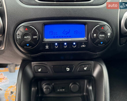 Сірий Хендай іх35, об'ємом двигуна 2 л та пробігом 132 тис. км за 11999 $, фото 28 на Automoto.ua