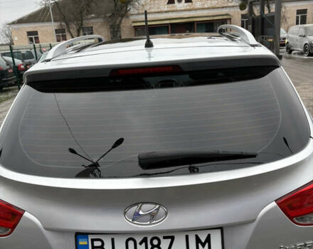 Сірий Хендай іх35, об'ємом двигуна 2 л та пробігом 237 тис. км за 12200 $, фото 4 на Automoto.ua