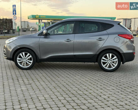 Сірий Хендай іх35, об'ємом двигуна 2 л та пробігом 262 тис. км за 13400 $, фото 8 на Automoto.ua