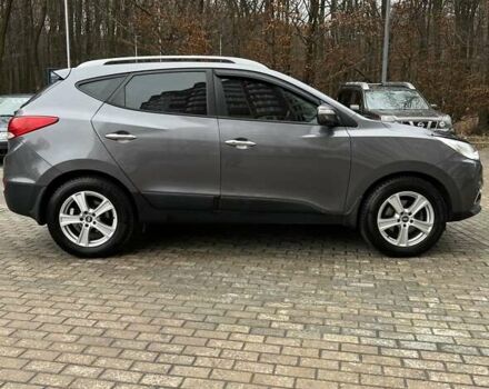 Сірий Хендай іх35, об'ємом двигуна 2.36 л та пробігом 220 тис. км за 11750 $, фото 5 на Automoto.ua