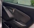 Сірий Хендай іх35, об'ємом двигуна 2 л та пробігом 178 тис. км за 13800 $, фото 8 на Automoto.ua