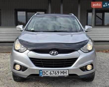 Сірий Хендай іх35, об'ємом двигуна 1.69 л та пробігом 308 тис. км за 11999 $, фото 2 на Automoto.ua