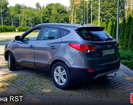 Сірий Хендай іх35, об'ємом двигуна 2 л та пробігом 235 тис. км за 11100 $, фото 11 на Automoto.ua