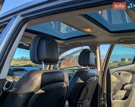 Сірий Хендай іх35, об'ємом двигуна 2 л та пробігом 175 тис. км за 10900 $, фото 42 на Automoto.ua