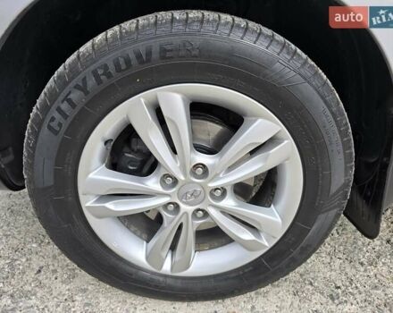 Сірий Хендай іх35, об'ємом двигуна 1.69 л та пробігом 308 тис. км за 11999 $, фото 8 на Automoto.ua