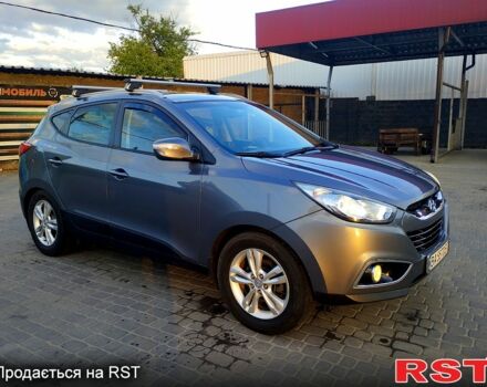 Сірий Хендай іх35, об'ємом двигуна 2 л та пробігом 230 тис. км за 11750 $, фото 4 на Automoto.ua