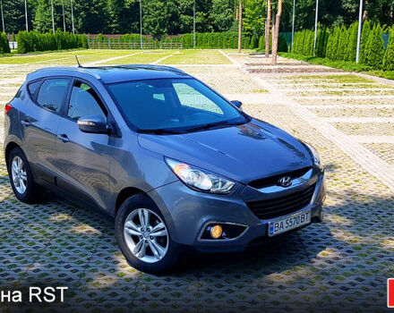 Сірий Хендай іх35, об'ємом двигуна 2 л та пробігом 235 тис. км за 11100 $, фото 7 на Automoto.ua