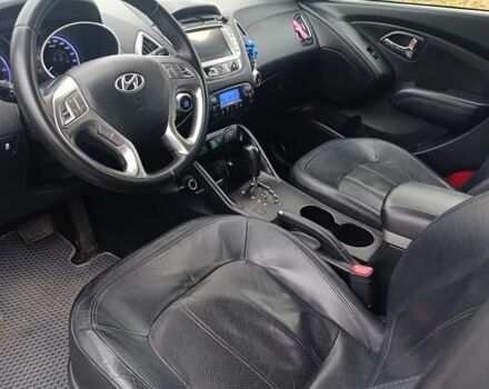 Сірий Хендай іх35, об'ємом двигуна 2 л та пробігом 240 тис. км за 11900 $, фото 4 на Automoto.ua