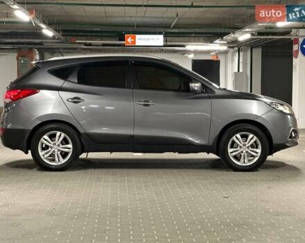 Сірий Хендай іх35, об'ємом двигуна 2 л та пробігом 176 тис. км за 11500 $, фото 7 на Automoto.ua