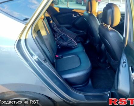 Сірий Хендай іх35, об'ємом двигуна 2 л та пробігом 230 тис. км за 11750 $, фото 9 на Automoto.ua