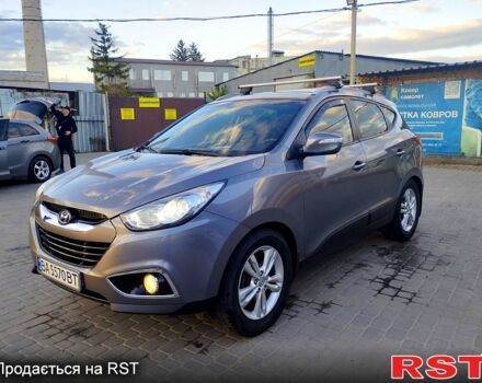 Сірий Хендай іх35, об'ємом двигуна 2 л та пробігом 230 тис. км за 11750 $, фото 2 на Automoto.ua