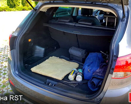 Сірий Хендай іх35, об'ємом двигуна 2 л та пробігом 235 тис. км за 11100 $, фото 6 на Automoto.ua