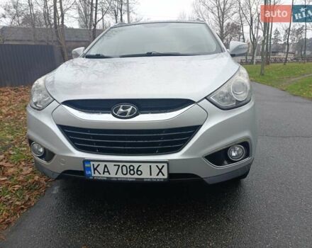 Сірий Хендай іх35, об'ємом двигуна 2 л та пробігом 240 тис. км за 11900 $, фото 19 на Automoto.ua