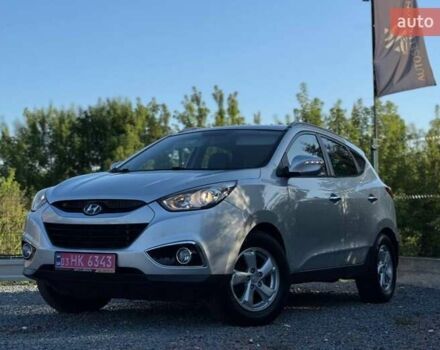 Сірий Хендай іх35, об'ємом двигуна 2 л та пробігом 216 тис. км за 12690 $, фото 11 на Automoto.ua
