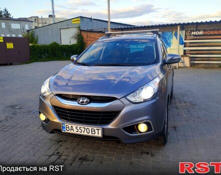 Сірий Хендай іх35, об'ємом двигуна 2 л та пробігом 230 тис. км за 11750 $, фото 3 на Automoto.ua