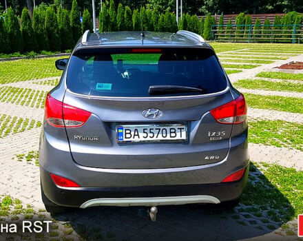 Сірий Хендай іх35, об'ємом двигуна 2 л та пробігом 235 тис. км за 11100 $, фото 4 на Automoto.ua