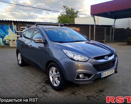 Сірий Хендай іх35, об'ємом двигуна 2 л та пробігом 230 тис. км за 11750 $, фото 1 на Automoto.ua