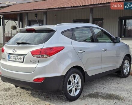 Сірий Хендай іх35, об'ємом двигуна 1.69 л та пробігом 308 тис. км за 11999 $, фото 7 на Automoto.ua