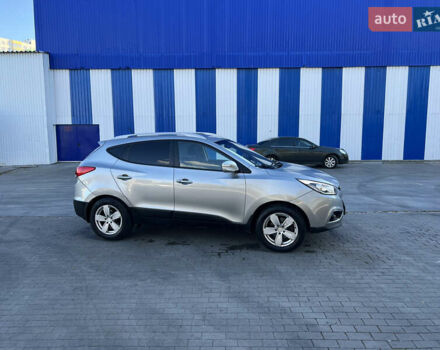 Сірий Хендай іх35, об'ємом двигуна 2 л та пробігом 156 тис. км за 11999 $, фото 7 на Automoto.ua