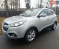 Сірий Хендай іх35, об'ємом двигуна 2 л та пробігом 240 тис. км за 11900 $, фото 1 на Automoto.ua