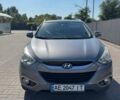 Сірий Хендай іх35, об'ємом двигуна 2 л та пробігом 175 тис. км за 12500 $, фото 4 на Automoto.ua