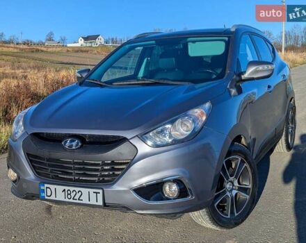 Сірий Хендай іх35, об'ємом двигуна 2 л та пробігом 175 тис. км за 10900 $, фото 7 на Automoto.ua