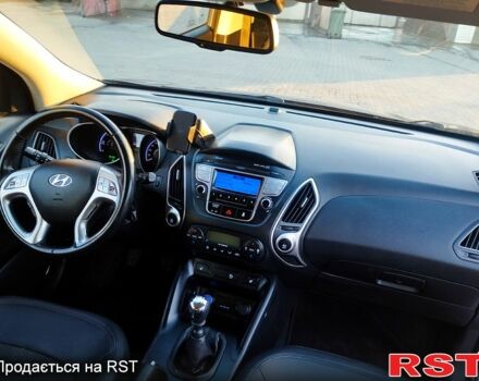 Сірий Хендай іх35, об'ємом двигуна 2 л та пробігом 230 тис. км за 11750 $, фото 10 на Automoto.ua