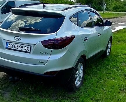 Сірий Хендай іх35, об'ємом двигуна 2 л та пробігом 97 тис. км за 12999 $, фото 2 на Automoto.ua