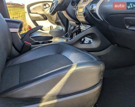 Сірий Хендай іх35, об'ємом двигуна 2 л та пробігом 175 тис. км за 10900 $, фото 49 на Automoto.ua