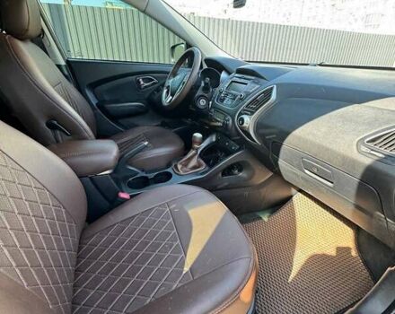 Сірий Хендай іх35, об'ємом двигуна 2 л та пробігом 175 тис. км за 12500 $, фото 10 на Automoto.ua