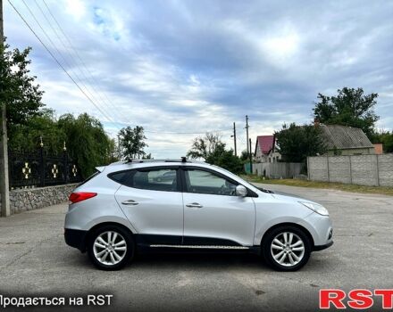 Серый Хендай их35, объемом двигателя 2.4 л и пробегом 155 тыс. км за 11999 $, фото 6 на Automoto.ua