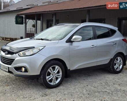 Сірий Хендай іх35, об'ємом двигуна 1.69 л та пробігом 308 тис. км за 11999 $, фото 4 на Automoto.ua