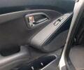 Сірий Хендай іх35, об'ємом двигуна 2 л та пробігом 240 тис. км за 11900 $, фото 5 на Automoto.ua