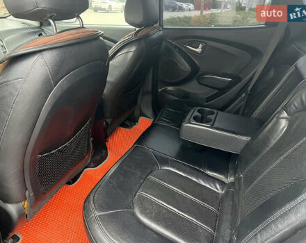 Сірий Хендай іх35, об'ємом двигуна 2 л та пробігом 156 тис. км за 9500 $, фото 7 на Automoto.ua