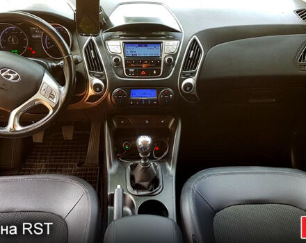 Сірий Хендай іх35, об'ємом двигуна 2 л та пробігом 235 тис. км за 11100 $, фото 8 на Automoto.ua