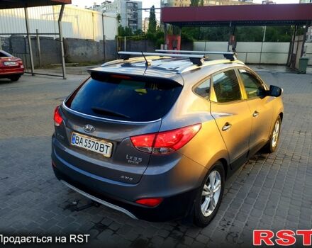 Сірий Хендай іх35, об'ємом двигуна 2 л та пробігом 230 тис. км за 11750 $, фото 5 на Automoto.ua