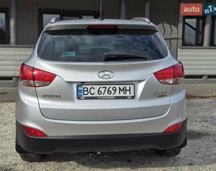 Сірий Хендай іх35, об'ємом двигуна 1.69 л та пробігом 308 тис. км за 11999 $, фото 6 на Automoto.ua