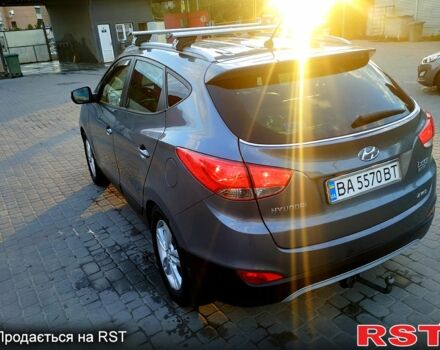Сірий Хендай іх35, об'ємом двигуна 2 л та пробігом 230 тис. км за 11750 $, фото 6 на Automoto.ua