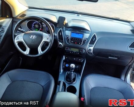 Сірий Хендай іх35, об'ємом двигуна 2 л та пробігом 230 тис. км за 11750 $, фото 8 на Automoto.ua