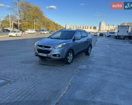 Сірий Хендай іх35, об'ємом двигуна 2 л та пробігом 156 тис. км за 11999 $, фото 6 на Automoto.ua