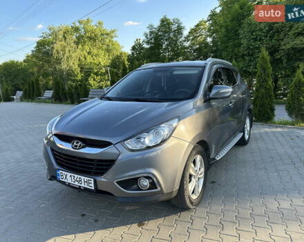 Сірий Хендай іх35, об'ємом двигуна 2 л та пробігом 144 тис. км за 13600 $, фото 11 на Automoto.ua