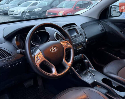 Сірий Хендай іх35, об'ємом двигуна 2 л та пробігом 240 тис. км за 13000 $, фото 14 на Automoto.ua