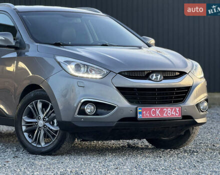 Сірий Хендай іх35, об'ємом двигуна 2 л та пробігом 230 тис. км за 14450 $, фото 4 на Automoto.ua