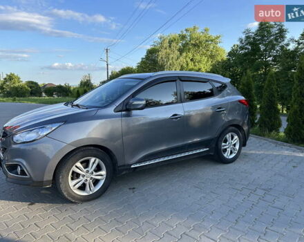 Сірий Хендай іх35, об'ємом двигуна 2 л та пробігом 144 тис. км за 13600 $, фото 5 на Automoto.ua