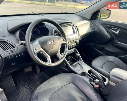 Сірий Хендай іх35, об'ємом двигуна 2 л та пробігом 178 тис. км за 11999 $, фото 6 на Automoto.ua