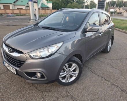 Сірий Хендай іх35, об'ємом двигуна 2 л та пробігом 230 тис. км за 13300 $, фото 5 на Automoto.ua