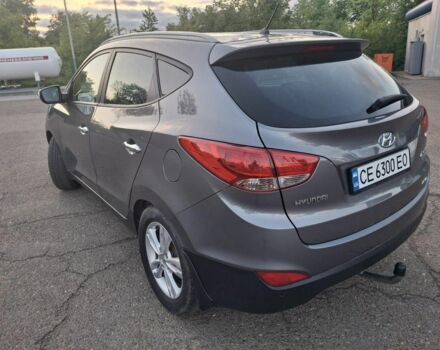 Сірий Хендай іх35, об'ємом двигуна 2 л та пробігом 230 тис. км за 13300 $, фото 6 на Automoto.ua