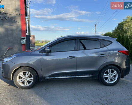 Сірий Хендай іх35, об'ємом двигуна 2 л та пробігом 144 тис. км за 13600 $, фото 14 на Automoto.ua