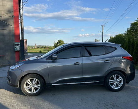 Сірий Хендай іх35, об'ємом двигуна 2 л та пробігом 144 тис. км за 13600 $, фото 13 на Automoto.ua