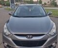 Сірий Хендай іх35, об'ємом двигуна 2 л та пробігом 230 тис. км за 13300 $, фото 1 на Automoto.ua